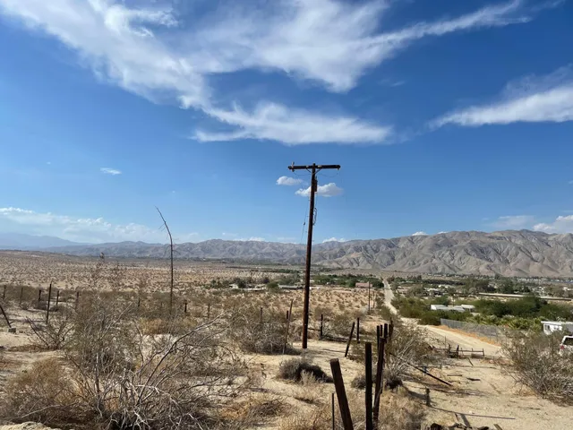 a view of ocean and mountains