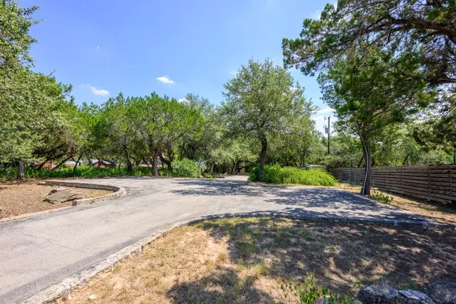 a view of a tree in front of a house