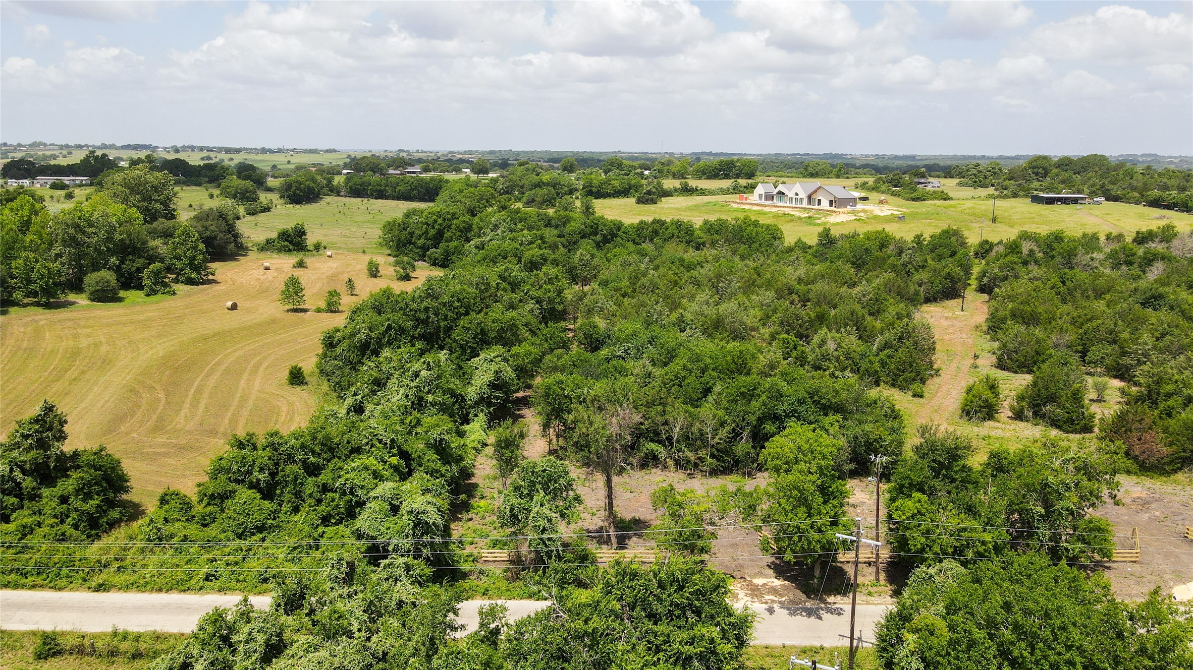 Lot 9 Wonder Hill Road Chappell Hill, TX 77426 - Photo 11 of 15 a view of a city with lots of trees