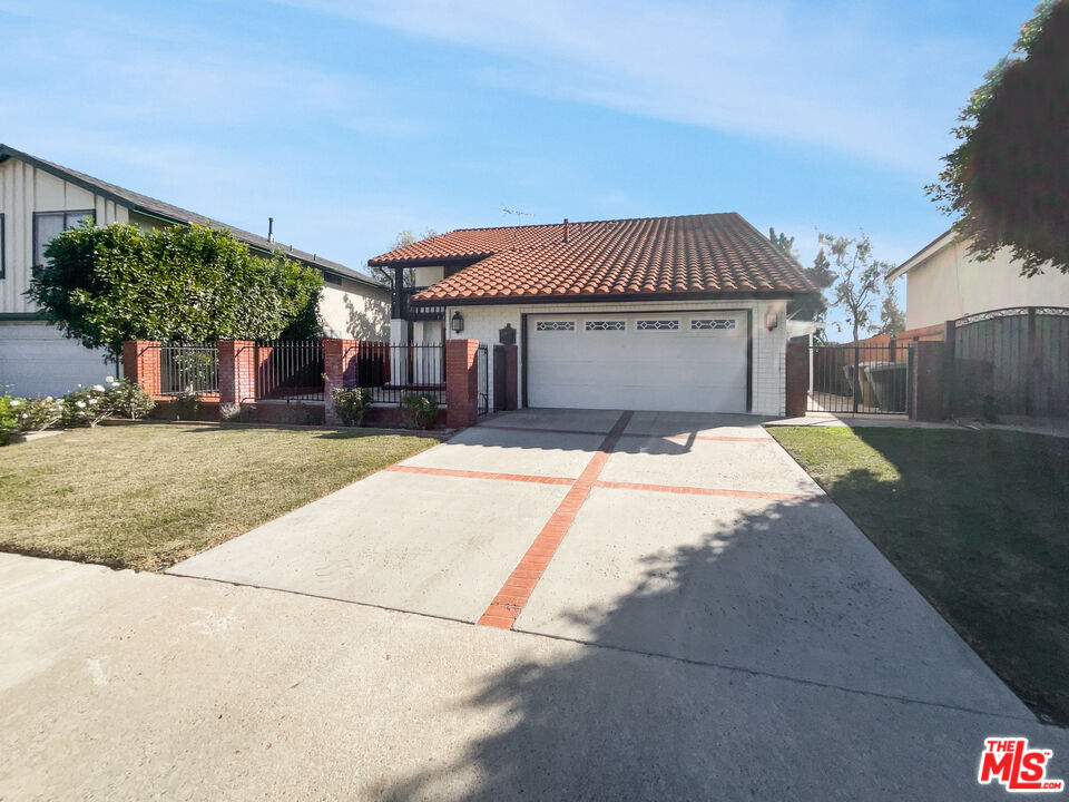 328 Valverde Avenue Brea, CA 92821 - Photo 2 of 21 a view of a house with a yard