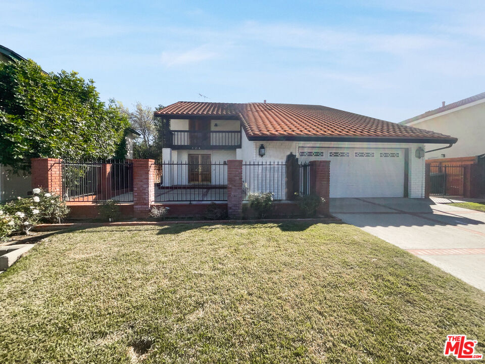328 Valverde Avenue Brea, CA 92821 - Photo 7 of 21 a front view of a house with a yard