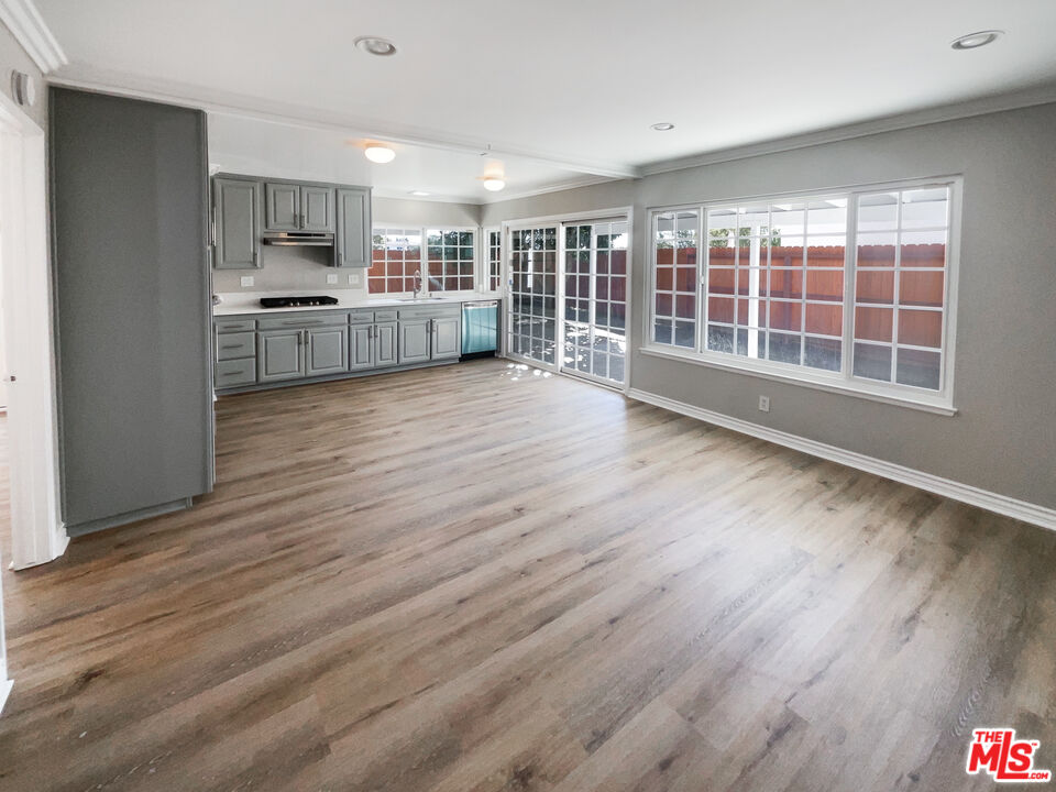 328 Valverde Avenue Brea, CA 92821 - Photo 8 of 21 a view of a kitchen with wooden floor and a sink