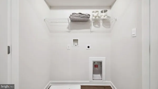 a bathroom with a shower and a door