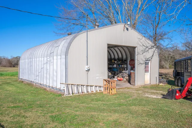 a view of a back yard of the house