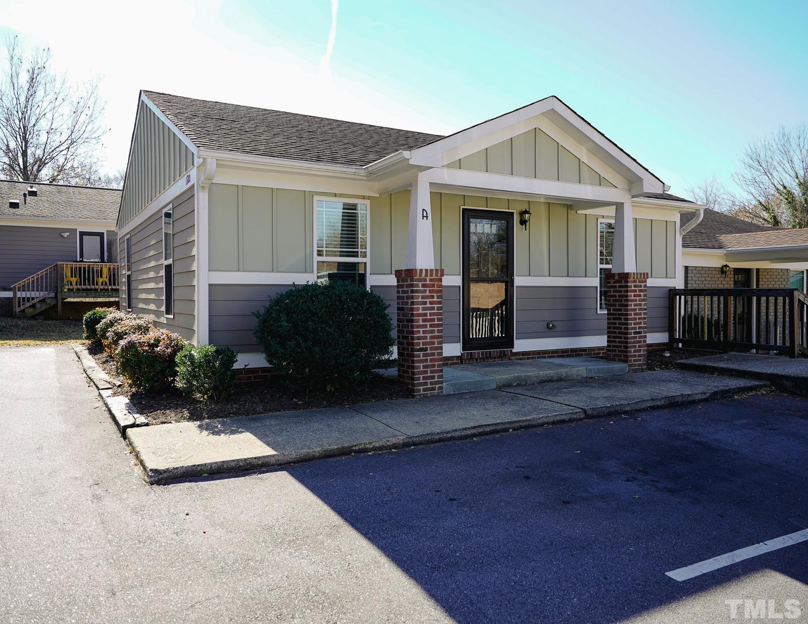 1320 South State Street, Unit A Raleigh, NC 27610 - Photo 1 of 20 a front view of a house with a yard