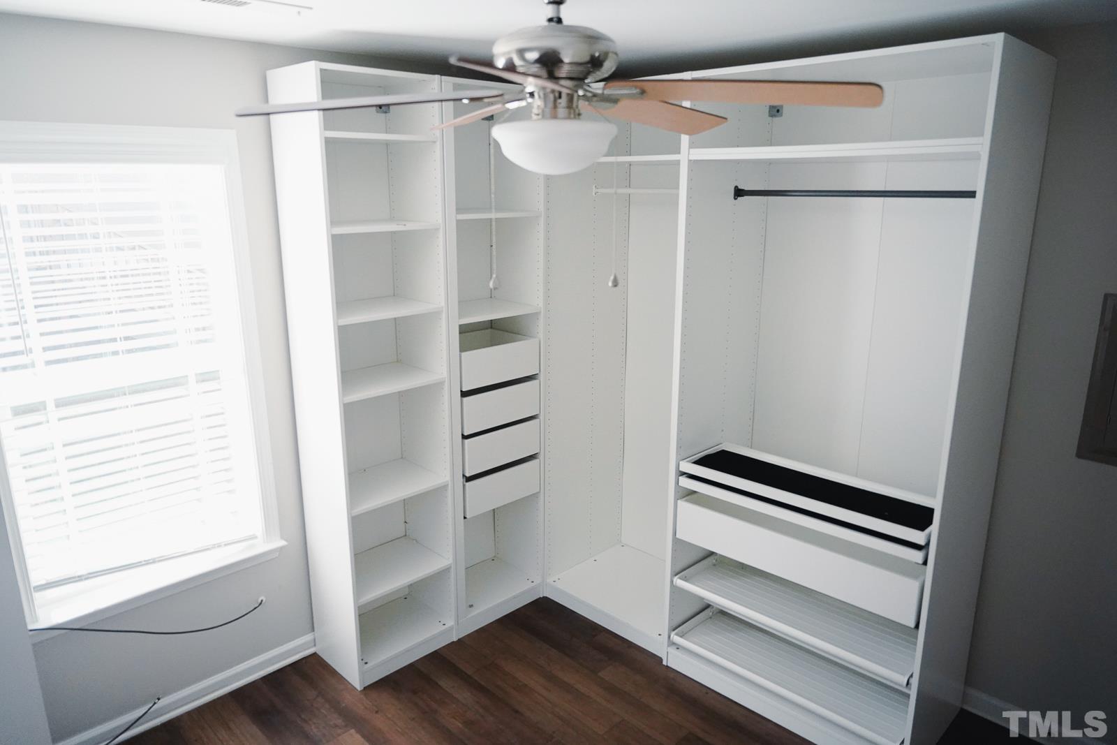 1320 South State Street, Unit A Raleigh, NC 27610 - Photo 12 of 20 a view of walk in closet with empty racks