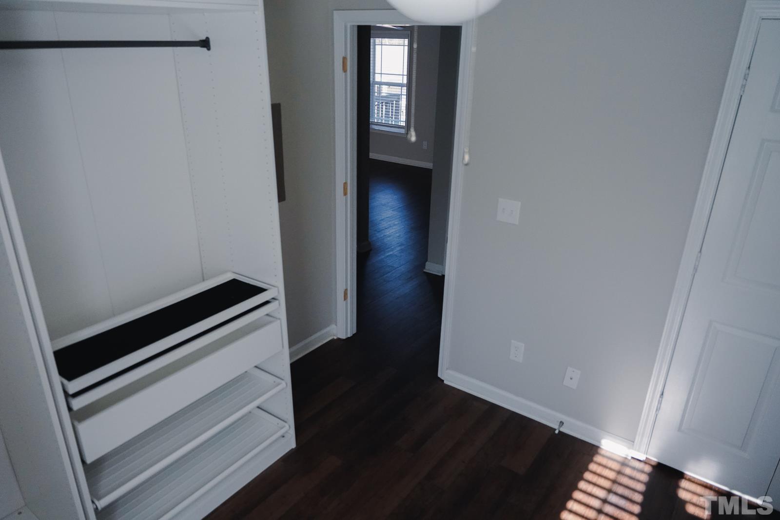 1320 South State Street, Unit A Raleigh, NC 27610 - Photo 13 of 20 a view of an empty walk in closet