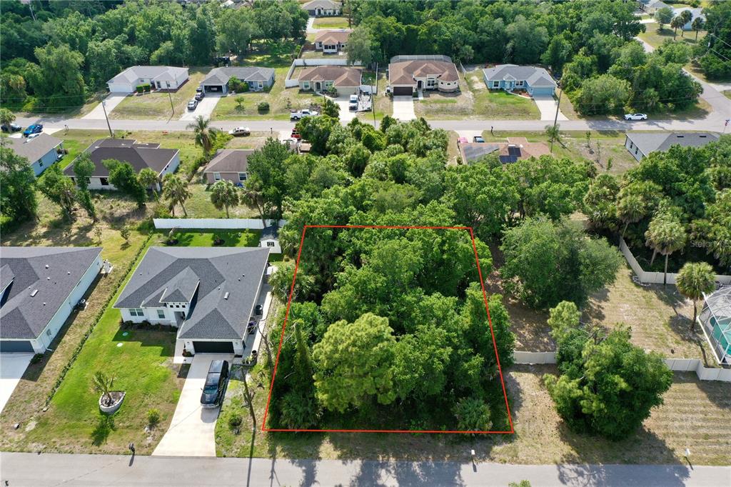 Saturday St Port North Port, FL 34288 - Photo 1 of 1 an aerial view of a house with garden space and street view
