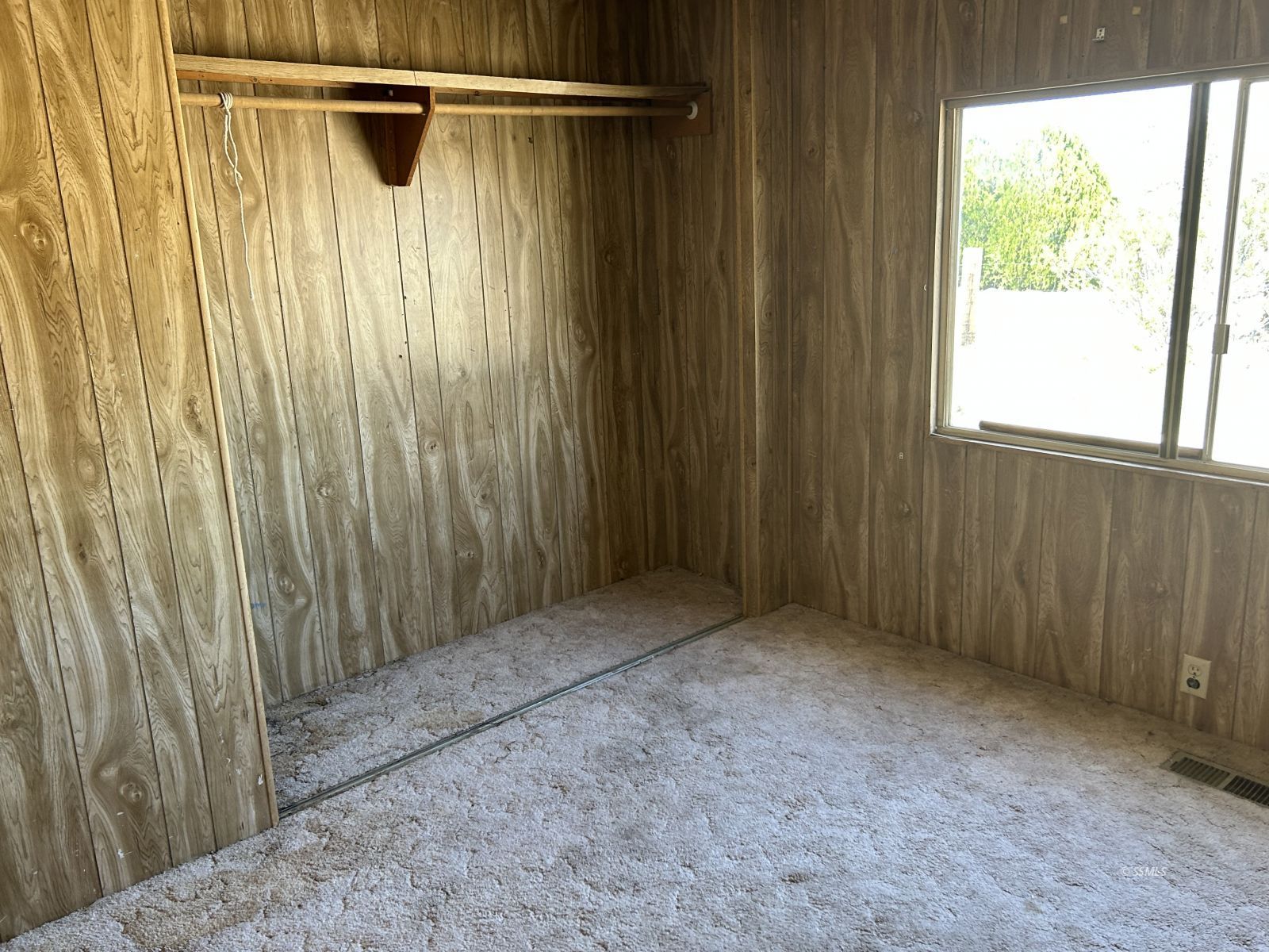 1057 North Calvert Boulevard Ridgecrest, CA 93555 - Photo 19 of 23 a view of a bathroom with a shower and a window