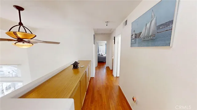a bathroom with a double vanity sink mirror and shower