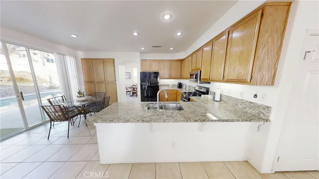 a kitchen with a counter top space and a sink