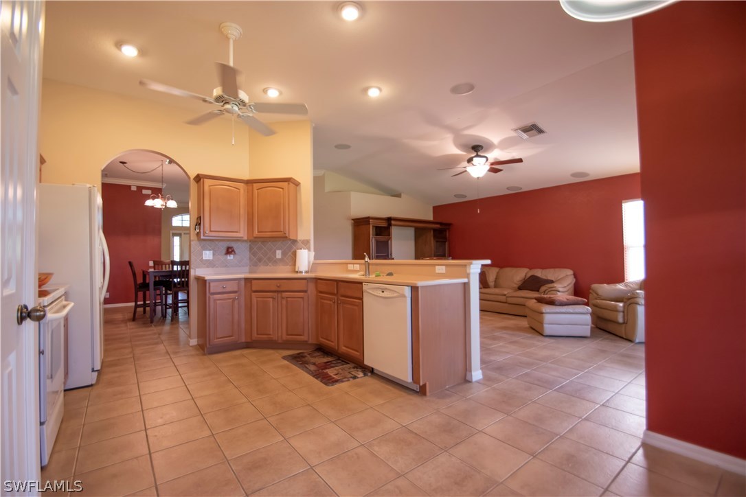 8879 Falcon Pointe Loop Fort Myers, FL 33912 - Photo 6 of 17 a kitchen with a sink and cabinets