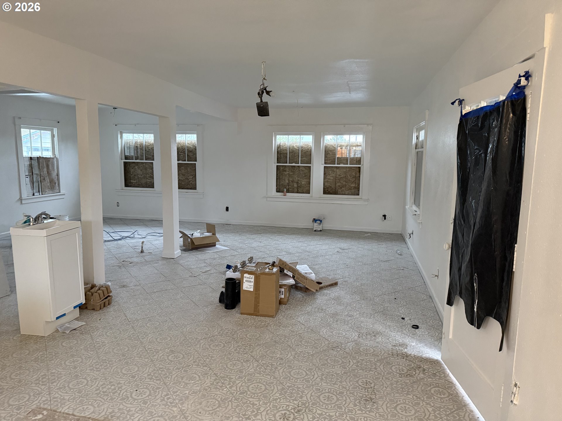 3945 Southwest 185th Avenue Beaverton, OR 97078 - Photo 5 of 26 a living room with furniture and a flat screen tv