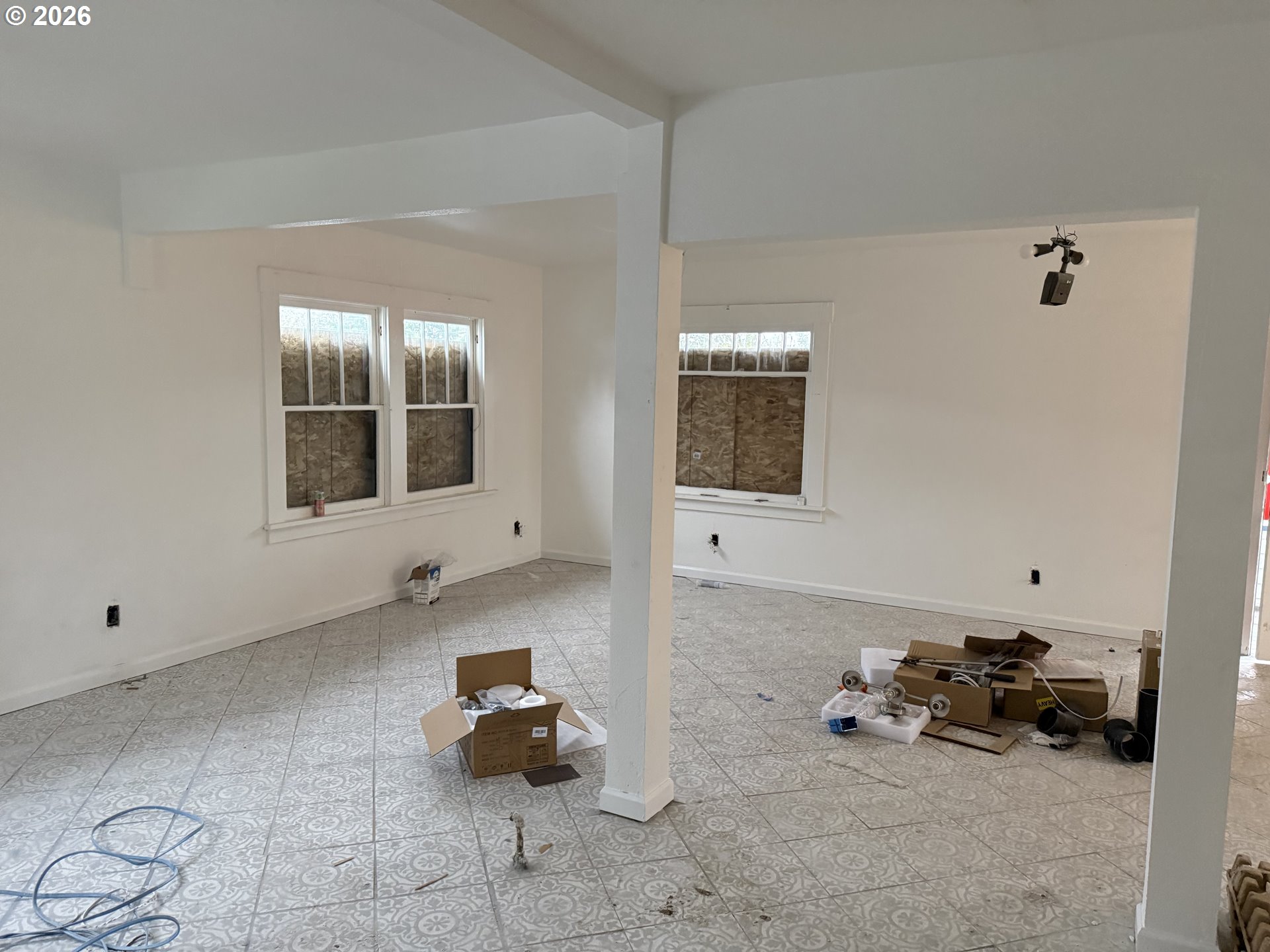 3945 Southwest 185th Avenue Beaverton, OR 97078 - Photo 7 of 26 a room with a window and couch