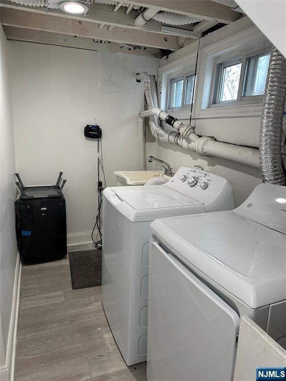 111 Teaneck Road Teaneck, NJ 07666 - Photo 19 of 22 a utility room with dryer and washer