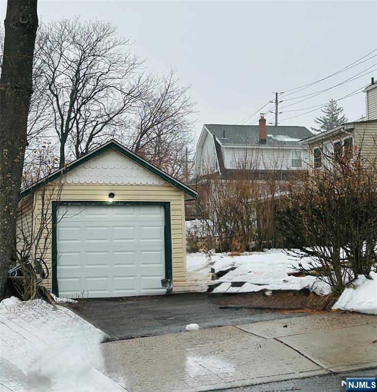 111 Teaneck Road Teaneck, NJ 07666 - Photo 21 of 22 a view of a house with a snow in the yard