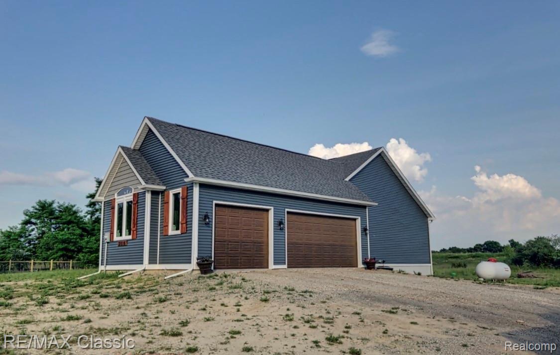 2816 Fisher Road Howell, MI 48855 - Photo 2 of 38 Fabulous 3.5 car garage!