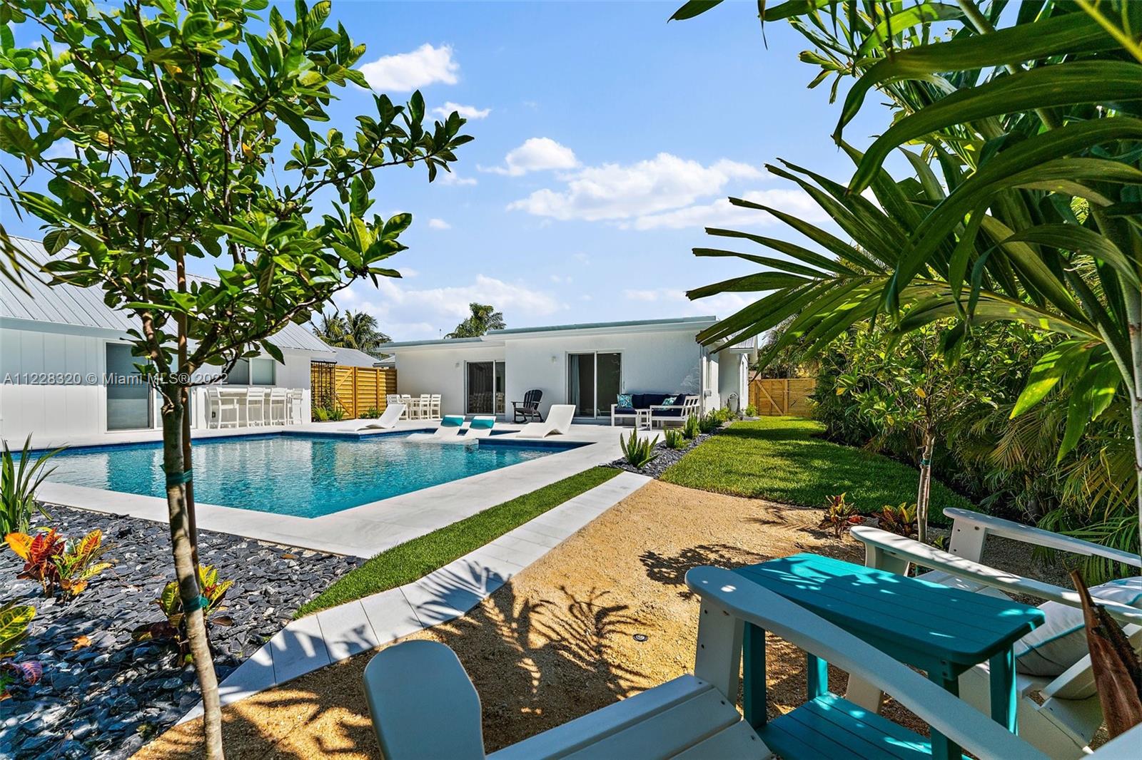 19 Shay Place Tequesta, FL 33469 - Photo 1 of 46 a view of a patio with swimming pool
