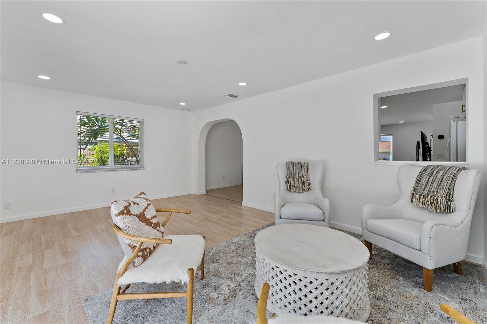 19 Shay Place Tequesta, FL 33469 - Photo 22 of 46 a living room with furniture and a couch