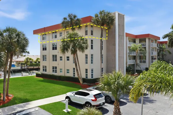 a front view of building with yard