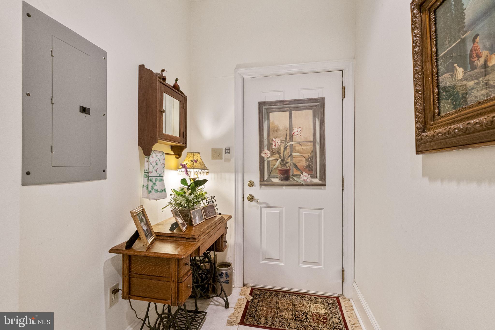 119 Record Street, Unit 1 Frederick, MD 21701 - Photo 55 of 72 mudroom and exit to rear garden and garage