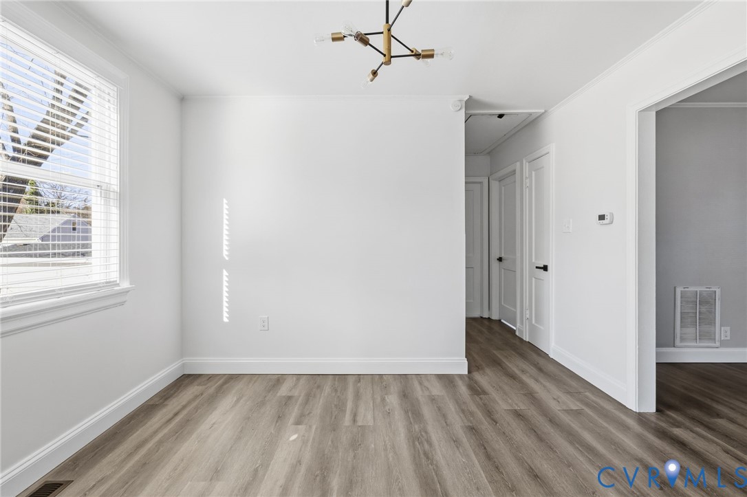 5009 Regent Road Richmond, VA 23230 - Photo 16 of 22 Spare room with light wood-type flooring, ornament