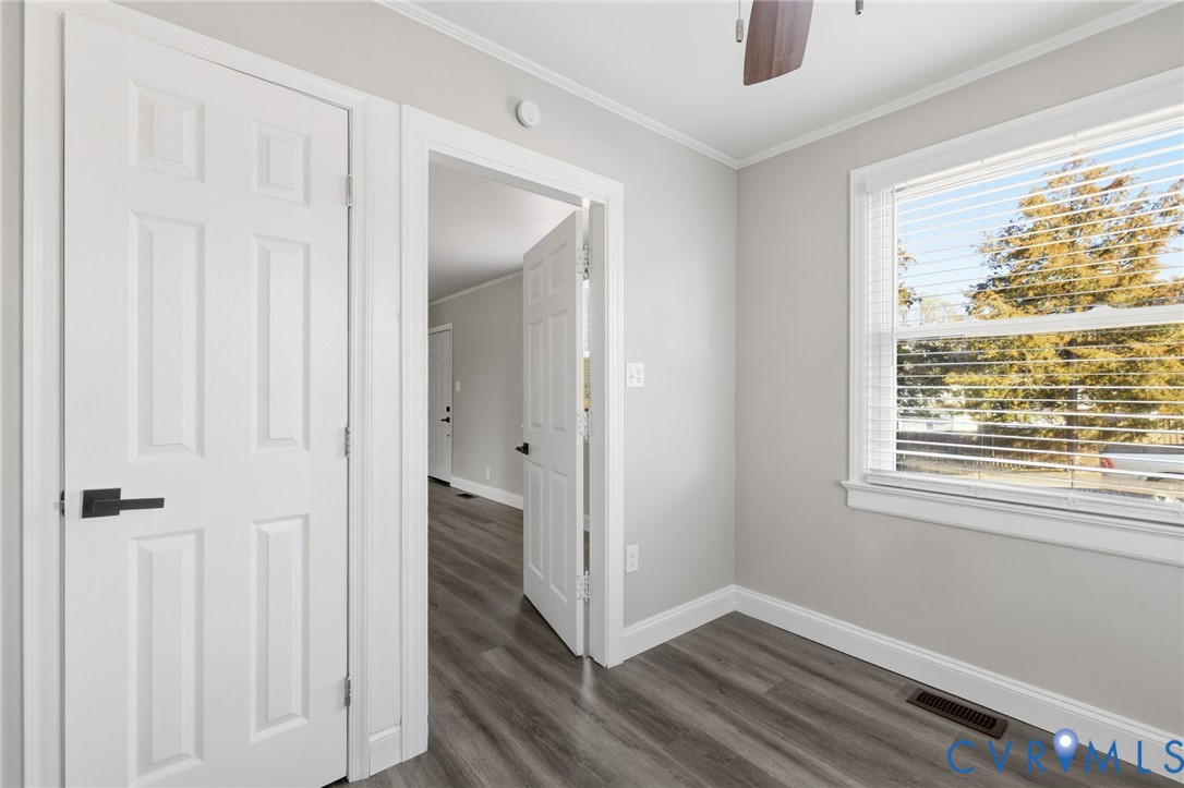 5009 Regent Road Richmond, VA 23230 - Photo 8 of 22 Empty room featuring crown molding, ceiling fan, a