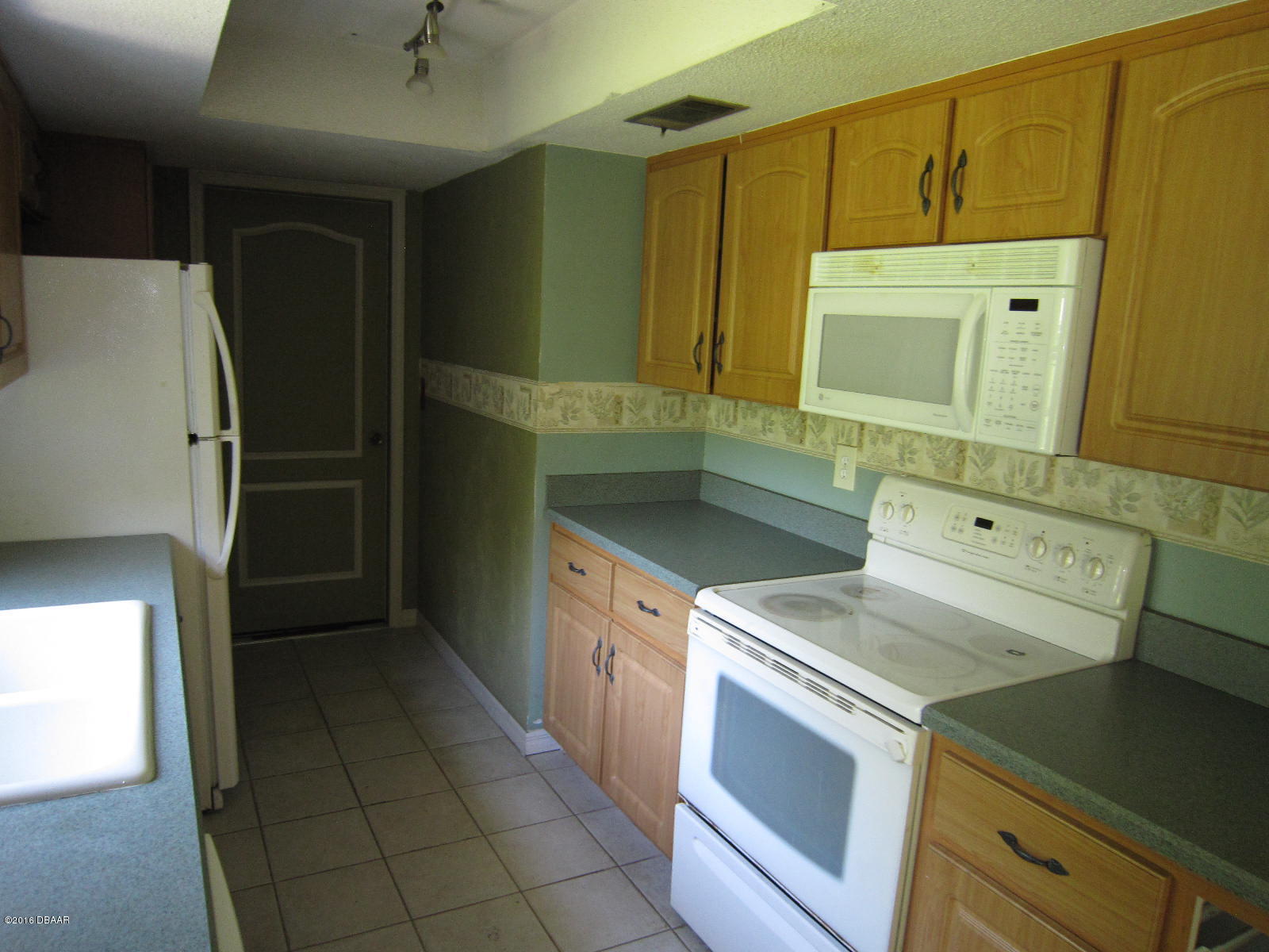 1706 Western Road South Daytona, FL 32119 - Photo 4 of 16 a utility room with washer and dryer