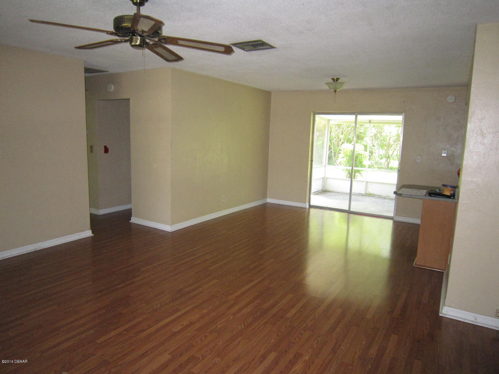 1706 Western Road South Daytona, FL 32119 - Photo 6 of 16 wooden floor in an empty room with a window