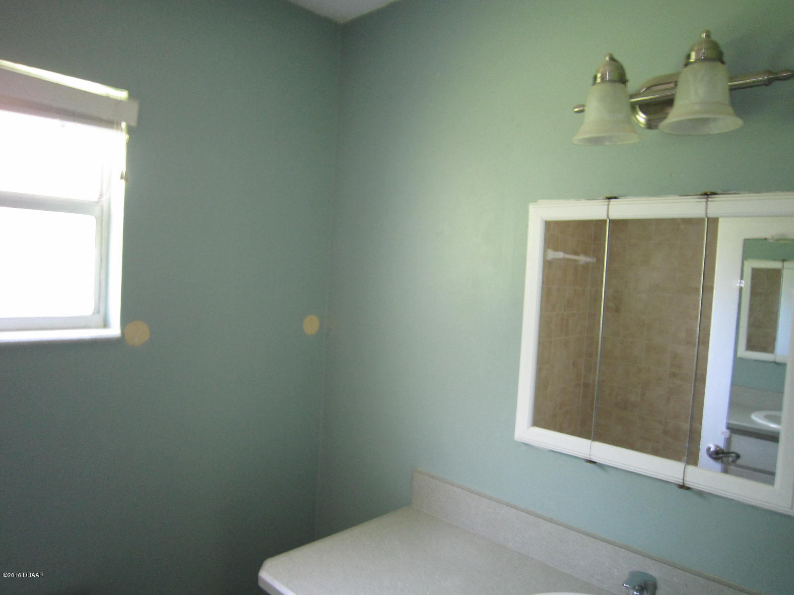1706 Western Road South Daytona, FL 32119 - Photo 9 of 16 a bathroom with a toilet