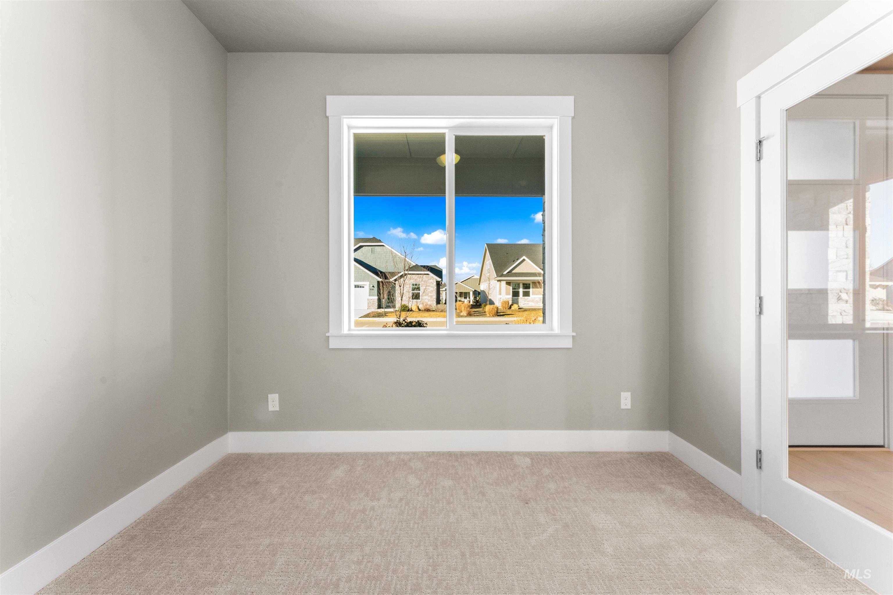 8081 Tandy Cove Street Middleton, ID 83644 - Photo 14 of 41 Spare room with light colored carpet and baseboards
