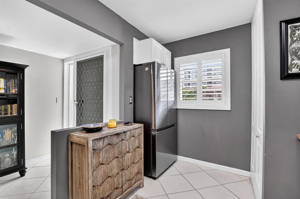 1537 East Hillsboro Boulevard, Unit 138 Deerfield Beach, FL 33441 - Photo 13 of 43 a view of room with window and refrigerator