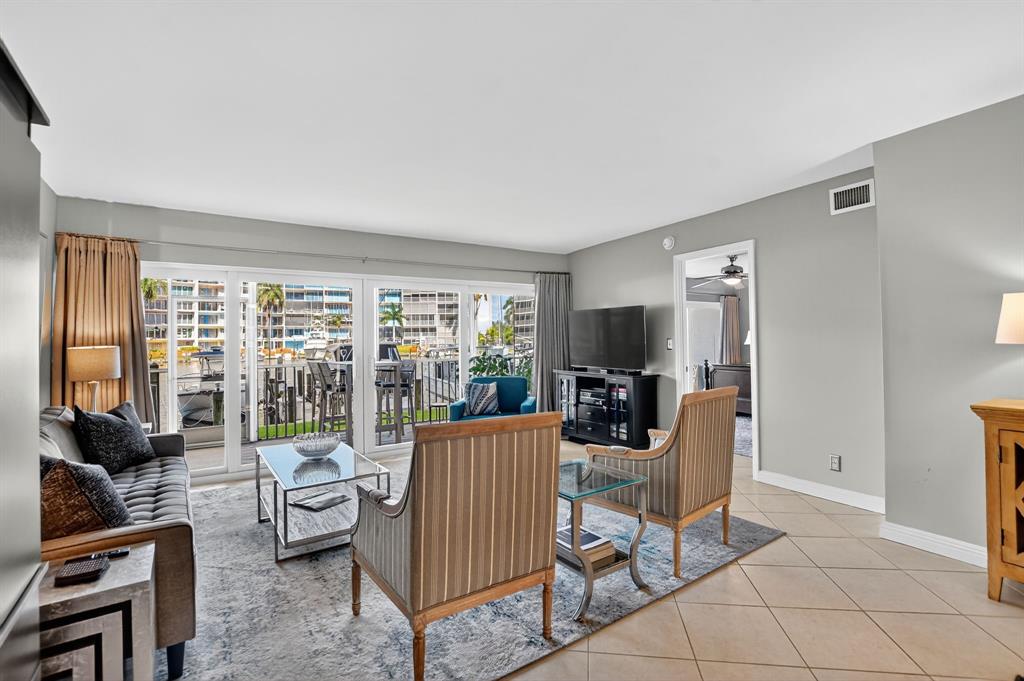 1537 East Hillsboro Boulevard, Unit 138 Deerfield Beach, FL 33441 - Photo 20 of 43 a view of a livingroom with furniture and a window