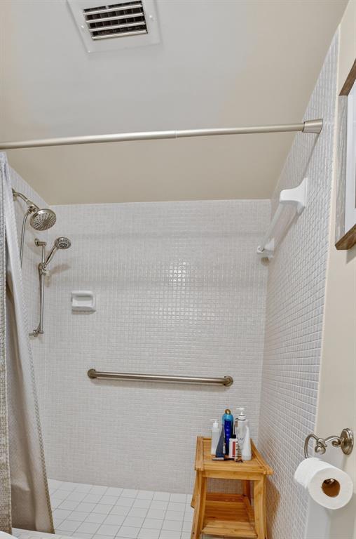 1537 East Hillsboro Boulevard, Unit 138 Deerfield Beach, FL 33441 - Photo 29 of 43 a bathroom with a sink and a shower