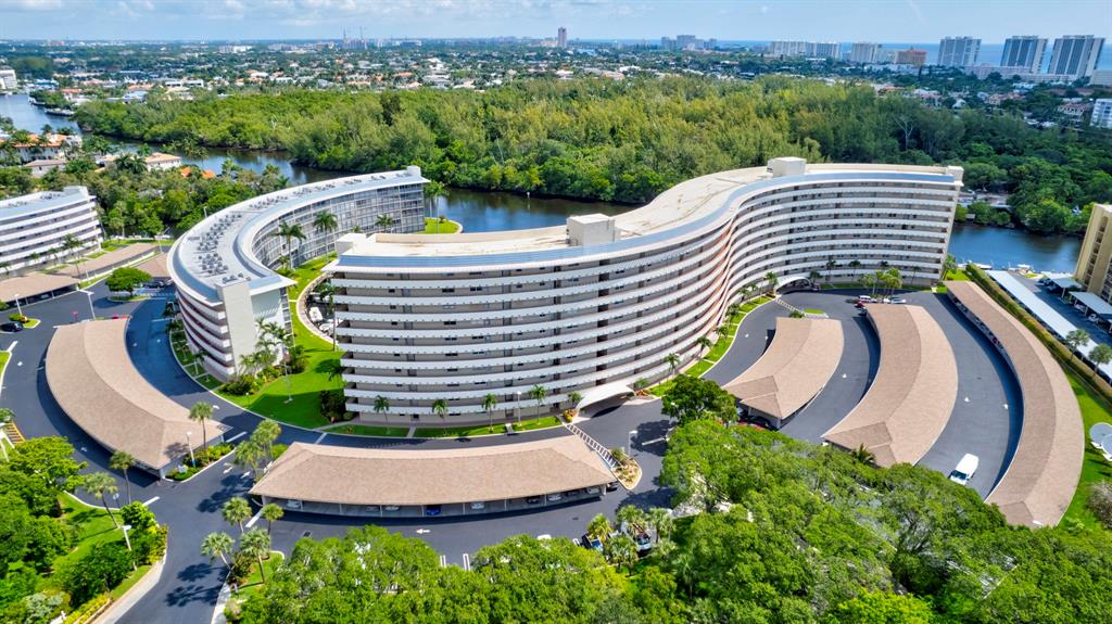1537 East Hillsboro Boulevard, Unit 138 Deerfield Beach, FL 33441 - Photo 6 of 43 an aerial view of a house with garden space and outdoor seating