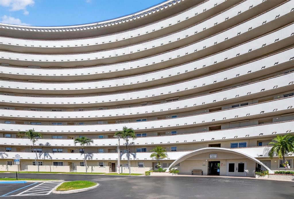 1537 East Hillsboro Boulevard, Unit 138 Deerfield Beach, FL 33441 - Photo 7 of 43 a view of swimming pool with a yard