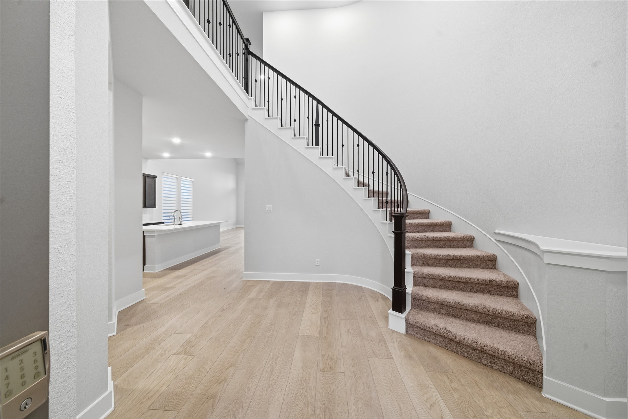 31719 Hatcher Grv Lane Fulshear, TX 77441 - Photo 3 of 40 a view of entryway and hall with wooden floor