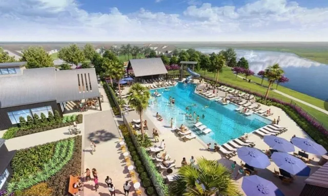 an aerial view of a house with outdoor space