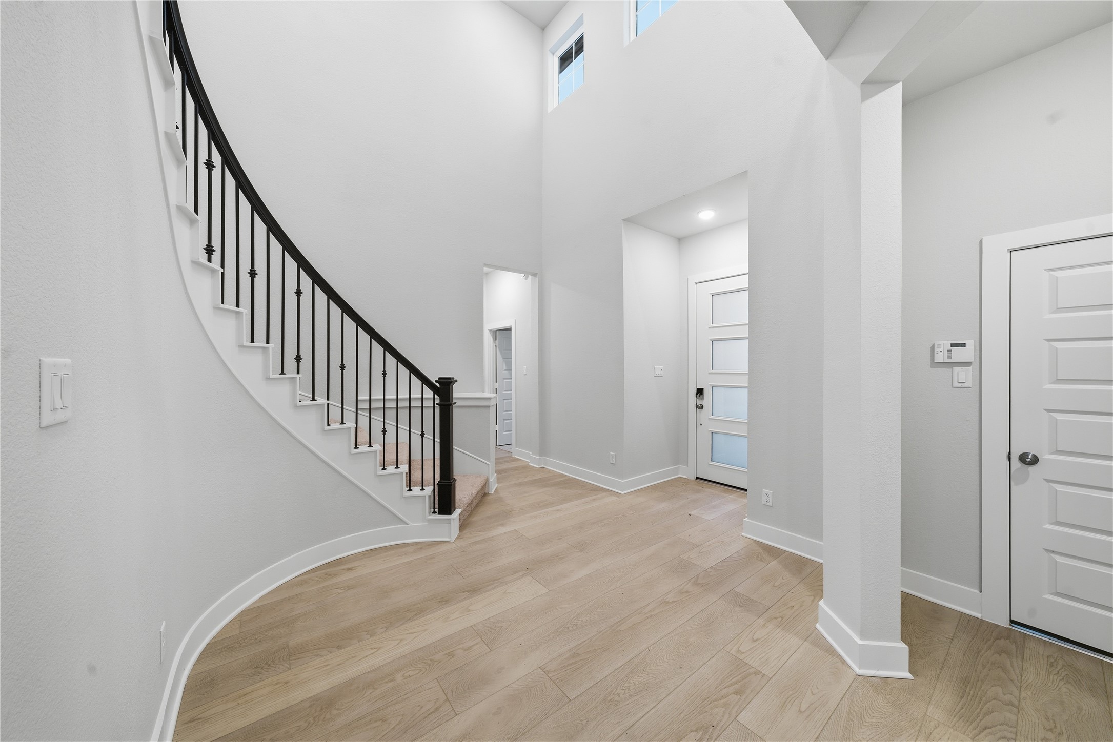 31719 Hatcher Grv Lane Fulshear, TX 77441 - Photo 5 of 40 a view of a hallway with staircase
