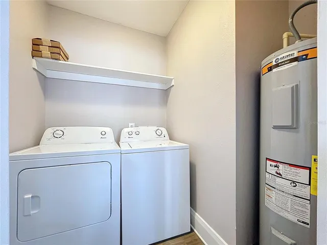 a utility room with dryer and washer