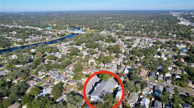 an aerial view of a houses with a outdoor space