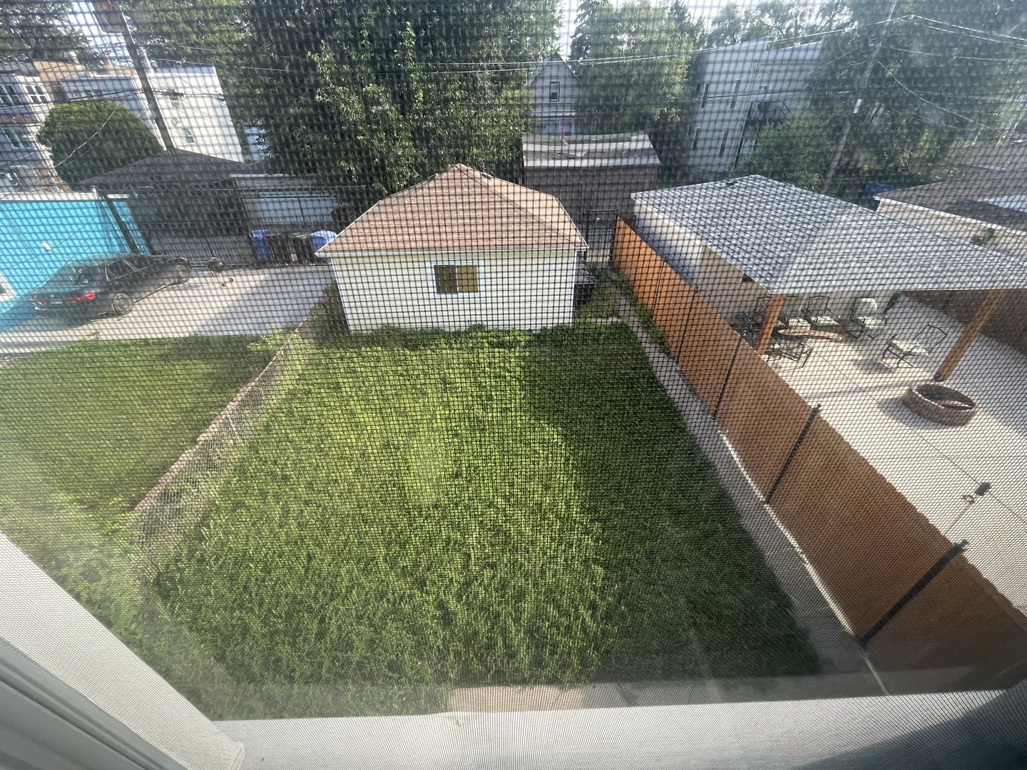 4435 West Thomas Street, Unit 1 Chicago, IL 60651 - Photo 11 of 11 a front view of a house with garden