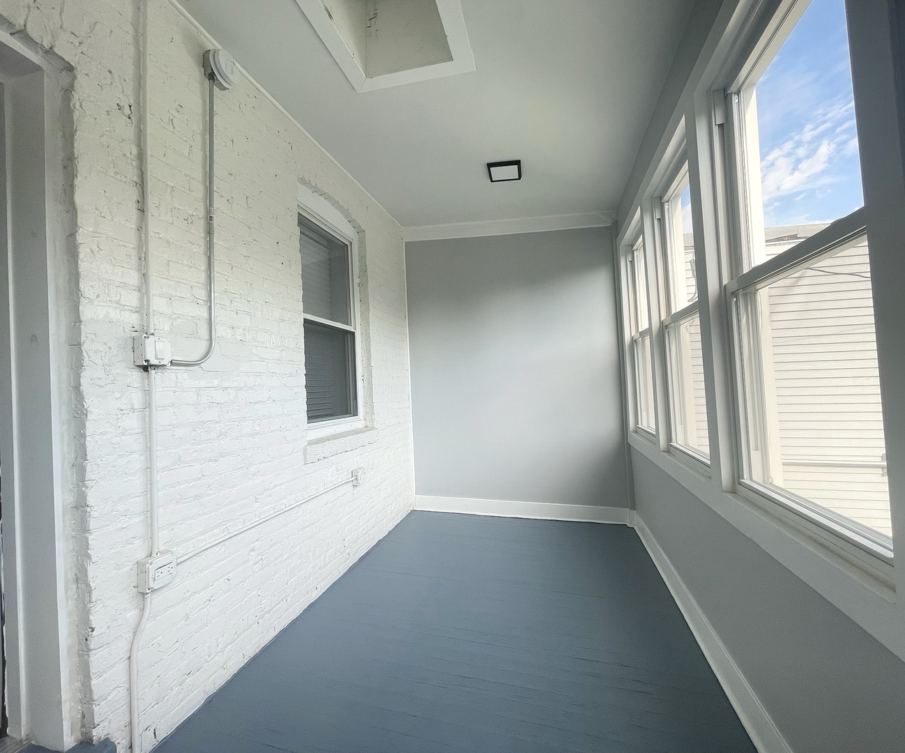 4435 West Thomas Street, Unit 1 Chicago, IL 60651 - Photo 9 of 11 a view of empty room with windows