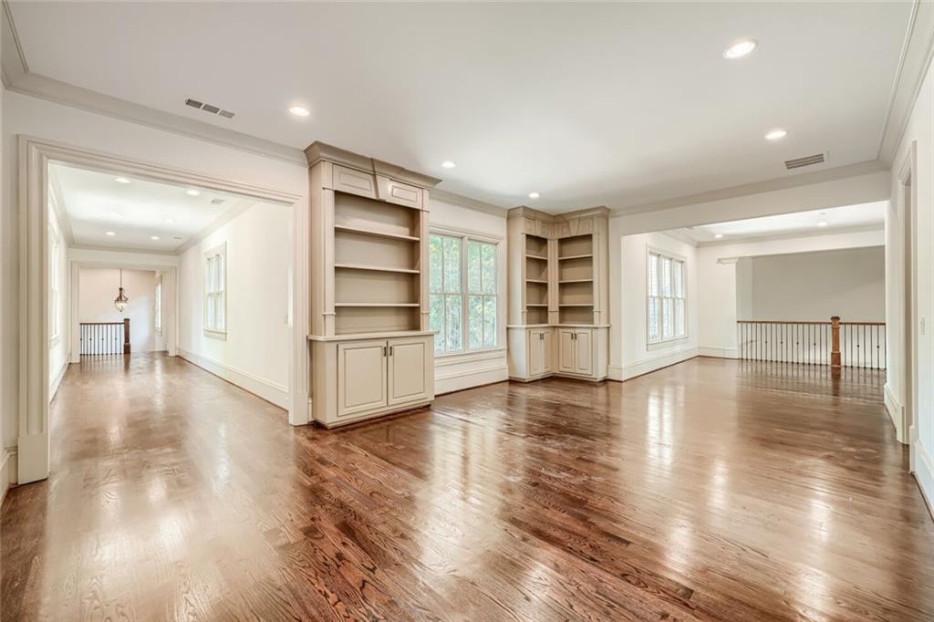 7965 Robin Road Cumming, GA 30041 - Photo 24 of 64 a view of a livingroom with wooden floor