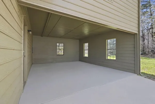 a view of an empty room and window