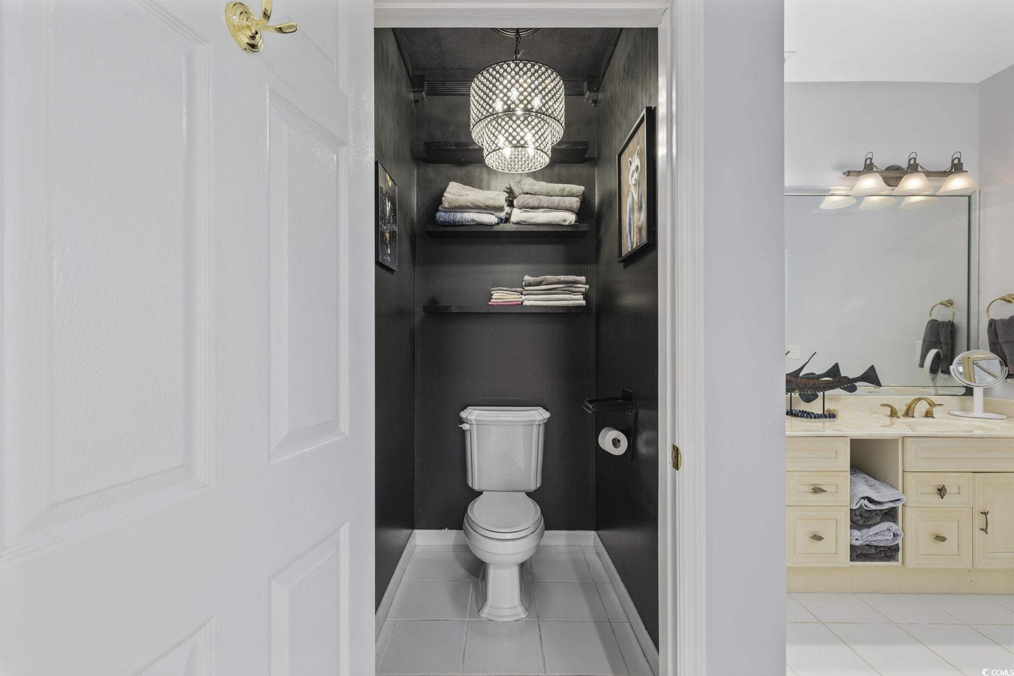 153 Watson Way Pawleys Island, SC 29585 - Photo 17 of 40 Bathroom with light tile patterned flooring and vanity