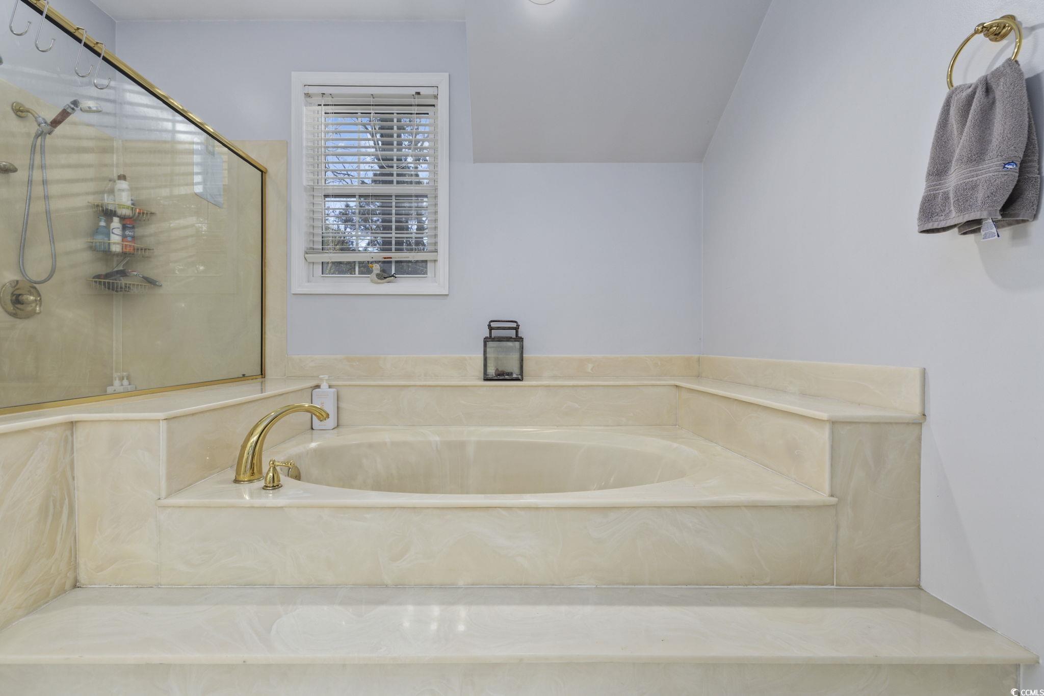 153 Watson Way Pawleys Island, SC 29585 - Photo 19 of 40 Full bathroom with a bath and a stall shower