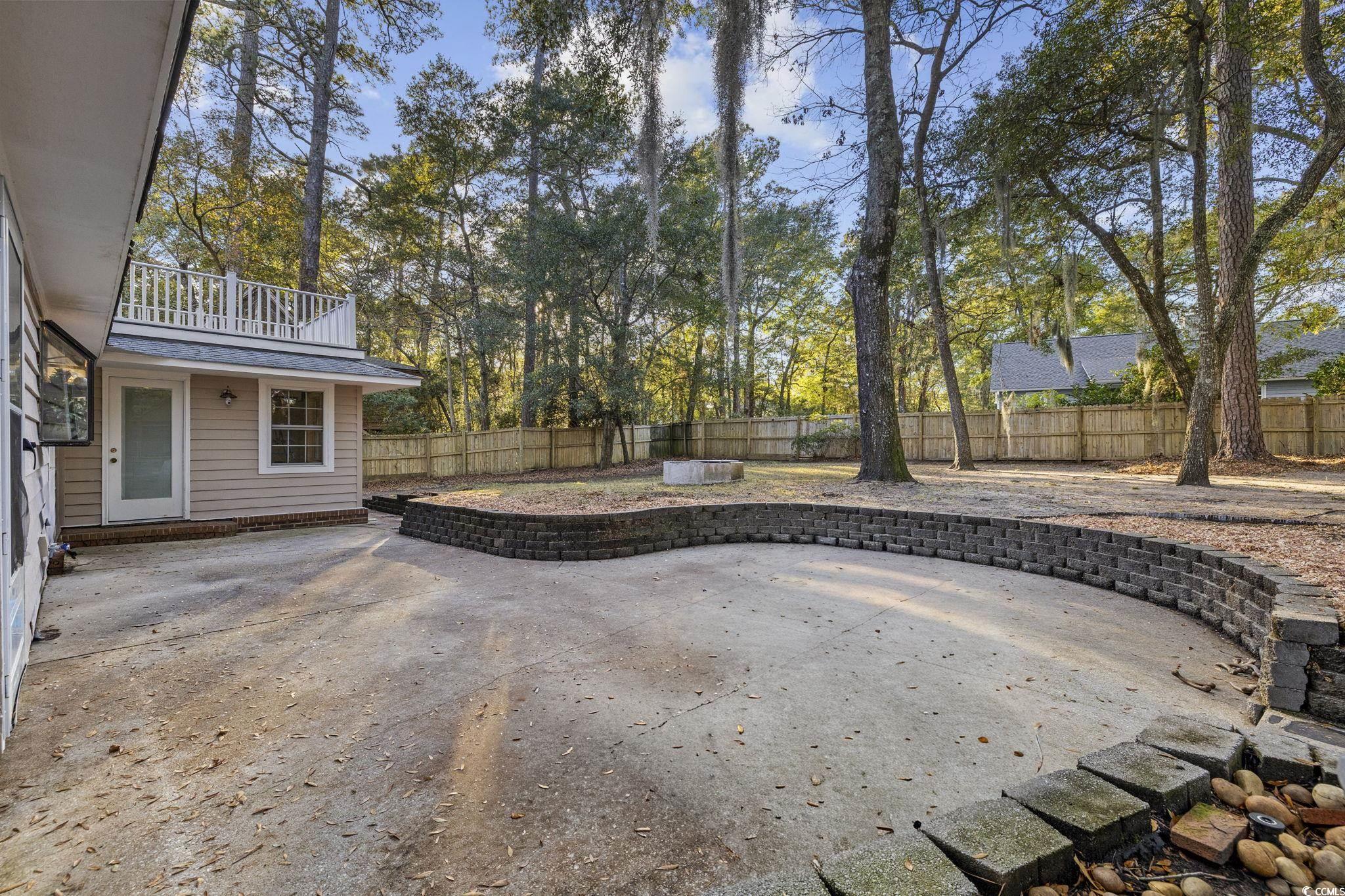 153 Watson Way Pawleys Island, SC 29585 - Photo 34 of 40 Patio / terrace with a patio and a fenced backyard
