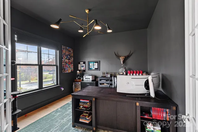 a room with furniture and a flat screen tv