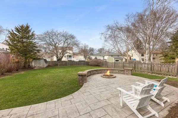 a view of a park with large trees
